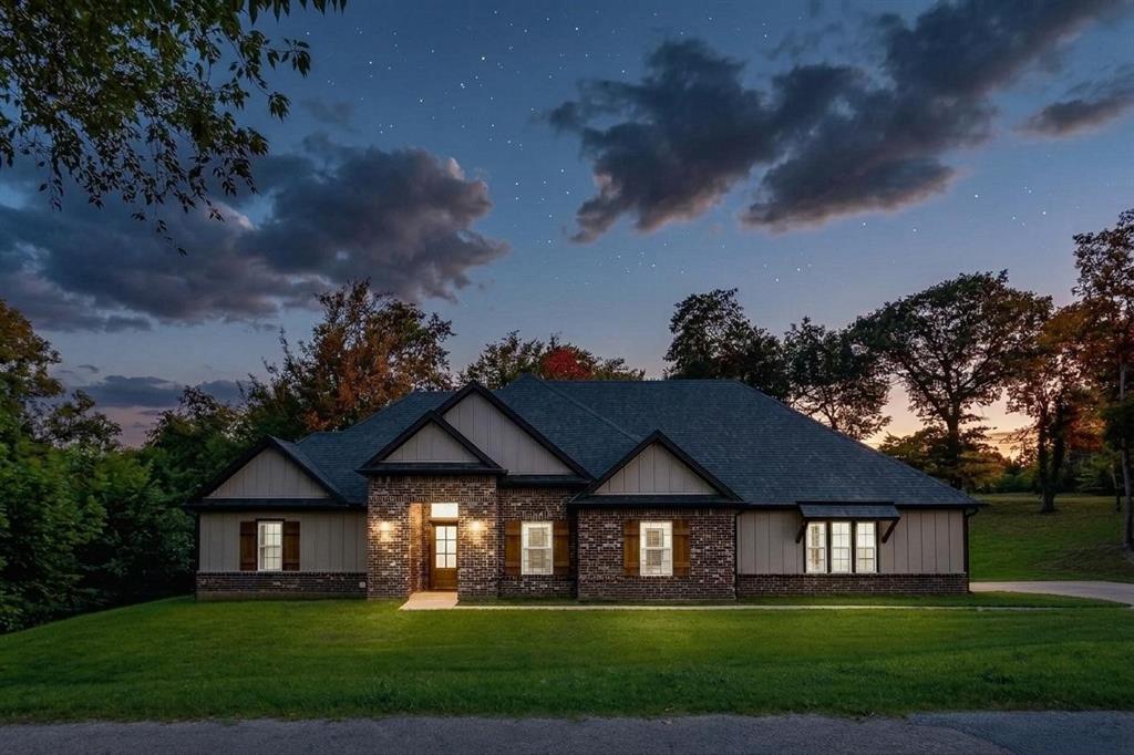 This stunning custom home in the heart of Denison, TX is just minutes from Waterloo Park, Historic Main Street, and less than an hour from McKinney. The open floor plan features a chef’s dream kitchen, and plumbed for gas with a large island perfect for gathering, flowing seamlessly to an outdoor kitchen and covered patio. The inviting drive-up appeal includes a side-entry garage, all set on .68 acres. With separated bedrooms and a luxurious primary suite with a walk-in closet big enough to be a playroom, dual vanities, a soaking tub, and a spa-like shower, relaxation is guaranteed. Check out the extra room located in the garage, used for home brewing in the past, but could be a great hobby room or workshop.  All of this in one of North America’s most charming cities, with an award-winning Main Street and just minutes from Lake Texoma.