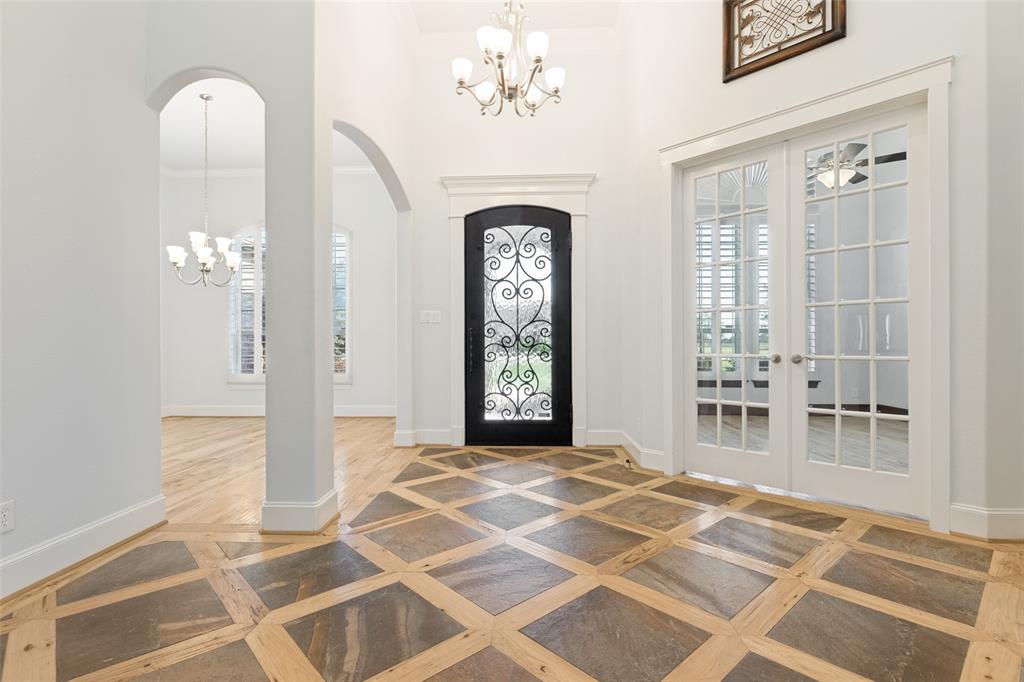 Exquisite Single-Story Retreat on Over an Acre in Award-Winning Allen ISD

Experience refined living in this stunning 4-bedroom, 4-bath luxury home perfectly designed for comfort, style, and entertaining. The open-concept layout showcases exotic hardwood floors, soaring exposed beams, and elegant finishes throughout. The gourmet kitchen is a chef’s dream, featuring a 6-burner gas stove with pot filler, premium appliances, and an expansive island ideal for gathering. A double-sided fireplace warms both the spacious primary bedroom and its serene sitting area, creating a relaxing retreat.
Step outside to a backyard oasis complete with a sparkling pool, outdoor kitchen, and generous patio—perfect for hosting or unwinding in complete privacy. A full MIL ensuite provides ideal accommodations for guests or multigenerational living.
Set on over an acre of beautifully landscaped grounds and located in the award-winning Allen School District, this home blends sophistication, functionality, and resort-style living in every detail.