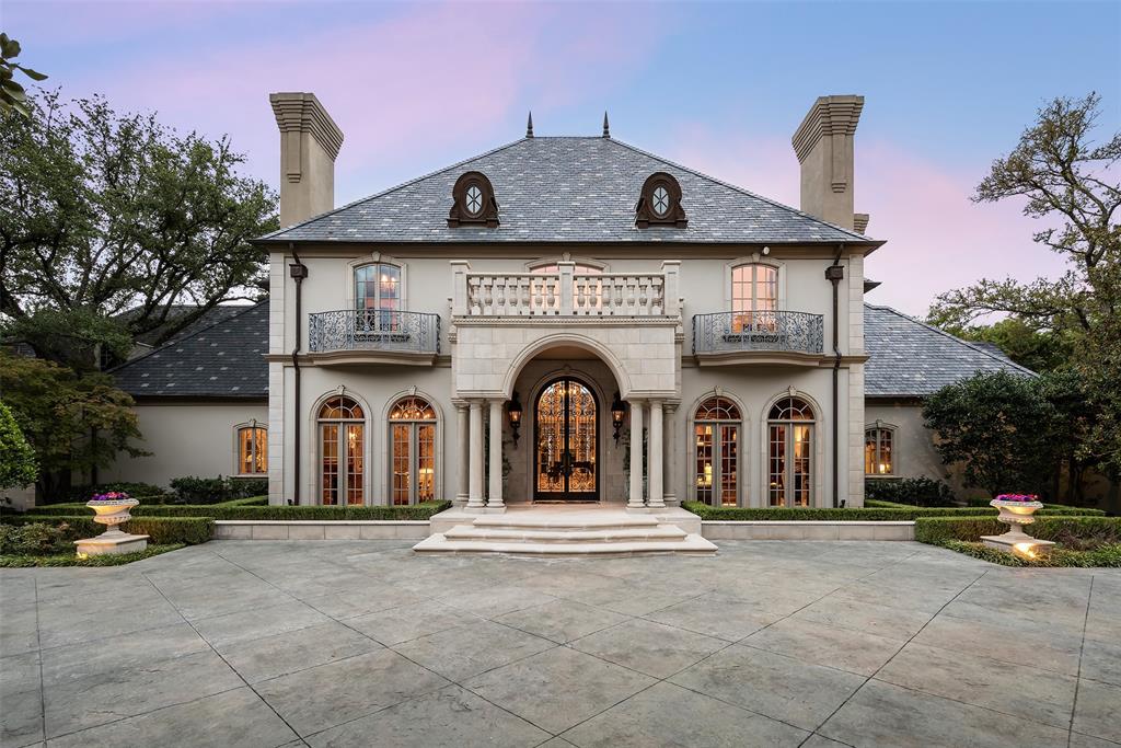 Exquisite French estate custom built with no expense spared by Sharif & Munir on a gated 1.12-acre maturely landscaped lot just off Strait Lane in Preston Hollow. Elegant lines, rich details, intricate floor patterns, fine woodwork and 8 fireplaces adorn this 9,900 sq ft manse with additional 851 sf quarters. Dramatic two-story foyer and multiple living spaces offer incredible entertaining options and views out. Downstairs primary suite with private courtyard features Beaux Art millwork and a dramatic black Patero marble bathroom. True gourmet kitchen with adjacent 1,600 bottle wine room. Expansive 390 sqft loggia overlooks pool and spa and manicured gardens. Geothermal, generator & 4-car garage.