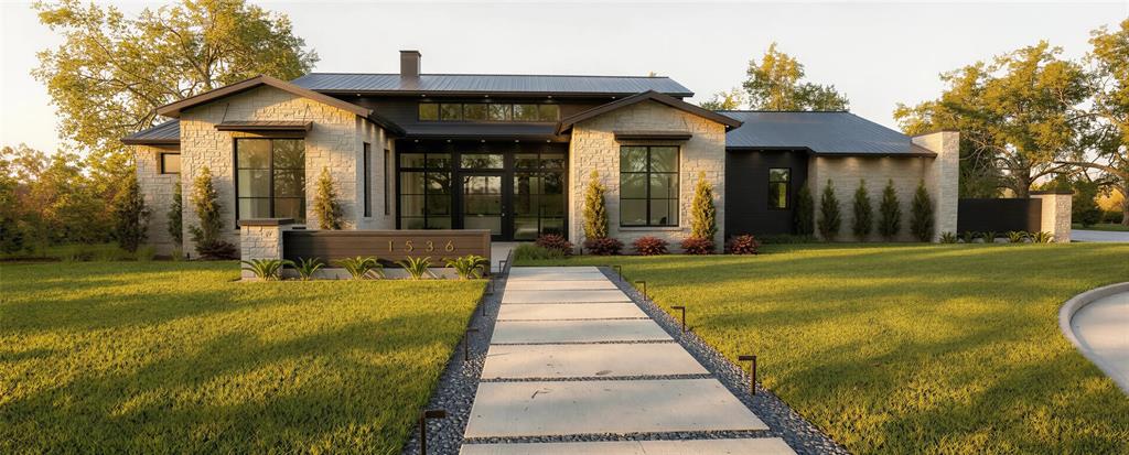 Experience refined luxury in this single-story modern contemporary home by Eclipse Custom Homes, where exceptional craftsmanship and thoughtful design are showcased. Featuring premium stone stucco paired with high-end composite cladding and a custom pivot door, this residence makes an unforgettable first impression. Wood flooring flows throughout the open-concept layout, designed for both comfortable everyday living and seamless entertaining. A private office provides a sophisticated workspace, while the living room is anchored by a sleek linear gas fireplace. The kitchen is outfitted with premium Thermador appliances, an oversized island with breakfast bar, a built-in refrigerator, gas range, and a separate prep kitchen for added convenience and functionality. Weather Shield wood windows enhance the home’s architectural character while bringing in abundant natural light. Kohler Purist plumbing fixtures elevate both the kitchen and baths with timeless, modern elegance. Sliding glass doors open to a large covered patio with a grilling area, creating effortless indoor-outdoor living ideal for year-round gatherings. Each bedroom is a private retreat, offering its own en suite bath and walk-in closet. The luxurious primary suite is a true sanctuary, featuring a sitting area, direct patio access, and a convenient connection to the laundry room. The spa-inspired primary bath delivers a serene escape with a freestanding soaking tub and elegant designer finishes. Designed with entertaining in mind, the Gameroom includes a wet bar and opens directly to the outdoor living space.  Premium materials—including quartz, quartzite, and granite countertops—are beautifully incorporated throughout the home. The backyard oasis is complete with an outdoor fireplace, creating the perfect setting for relaxing or entertaining under the open sky. Enhanced with luxury finishes and designer selections throughout, this home offers an elevated living experience with attention to every detail!