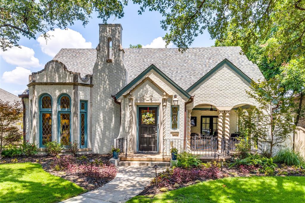 Exquisitely Restored & Expanded 1927 Dines & Kraft Spanish Eclectic Tudor in the Heart of Lakewood.  Meticulously remodeled by Maestri Studio, this stunning home blends timeless craftsmanship with modern luxury. Completed in fall 2019, the renovation introduced all-new systems while preserving its historic charm.  The front living area showcases original plaster moldings, vaulted ceilings, striking stained glass windows, and a remarkable Rookwood Aztec-pattern fireplace. The thoughtfully designed floor plan includes a main-level primary suite, formal living and dining rooms, and a study. Upstairs, you'll find three spacious bedrooms, a playroom, a newly added wine room, and a media room.  The reimagined open-concept kitchen features a dramatic waterfall quartzite island, designer lighting, Sub-Zero and Wolf appliances, and a walk-in pantry. Adjacent to the kitchen, the custom bar area highlights bespoke cabinetry and original Monday Morning tile.  A beautifully renovated detached casita offers a private retreat with a full kitchen, bath, and built-in Murphy bed, perfect as a separate guest suite.  Situated on an oversized 83 x 150 lot, this home is ideal for entertaining, featuring two covered porches, an outdoor kitchen, a turfed yard with a putting green, and a separate courtyard oasis with a tranquil fountain and fireplace.  Call Lee Lamont for a private showing.