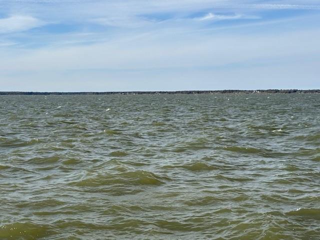 One acre lot located in Admiral Shores in a luxury gated community on Richland Chambers Lake! Enjoy breathtaking sunrises and sunsets over this open water view! Lakeside living at its finest and lot 9 already has a steel retaining well and walkway sidewalk with prime location to build your dream home in this exclusive gated community! Enjoy fishing, boating, swimming, dog park, paved roads and relaxing!