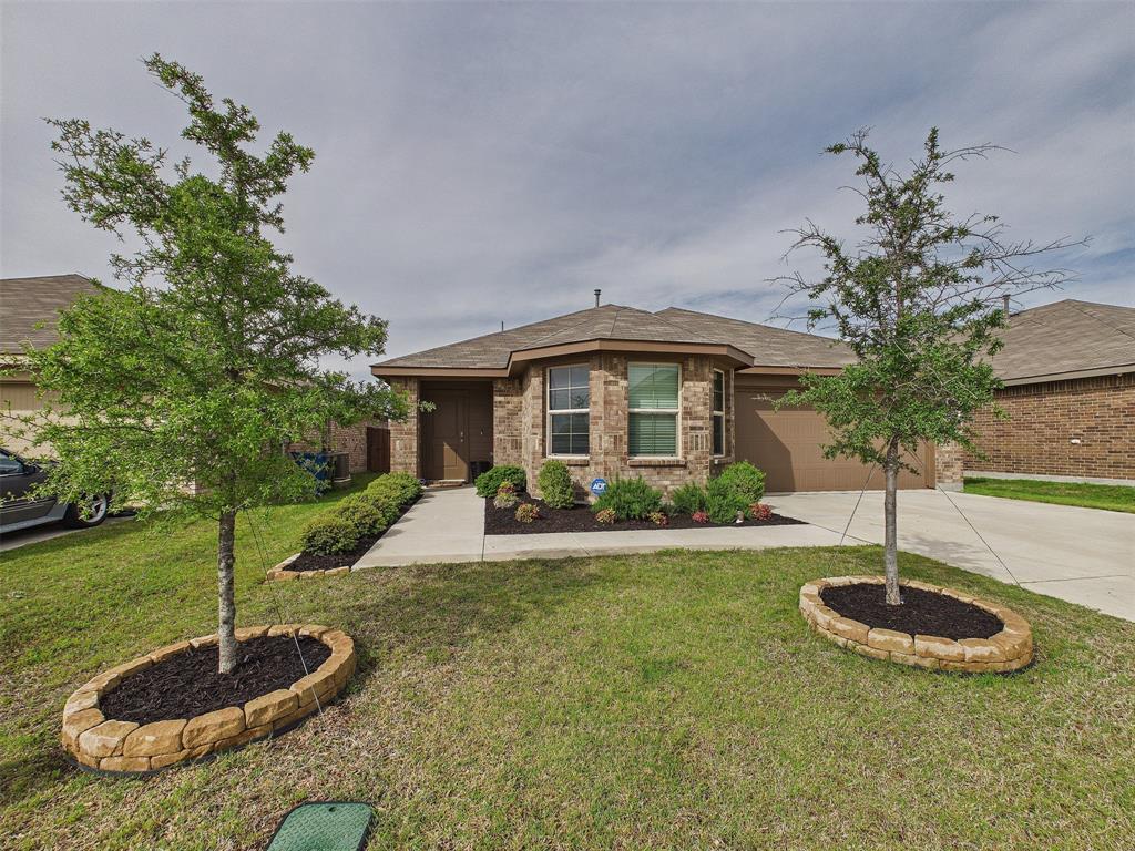 Set on a welcoming street in Justin, this home offers a functional and comfortable layout, perfect for everyday living. Step inside to an open concept living area where the kitchen seamlessly connects to the dining and living spaces, creating an ideal environment for entertaining or simply staying connected. The kitchen features ample cabinet storage and a generous island, ready for meal preparation.

The primary suite provides a private retreat, complete with an en-suite bathroom and walk-in closet, offering a peaceful space to unwind. Two additional bedrooms offer flexibility for family, guests, or a home office. A dedicated laundry room adds convenience to the home's practical design.

Outside, the backyard offers space for outdoor enjoyment. Located in Justin, this home provides convenient access to local amenities and is situated within a pleasant community. Schedule your private showing to explore the potential of this well-arranged home.