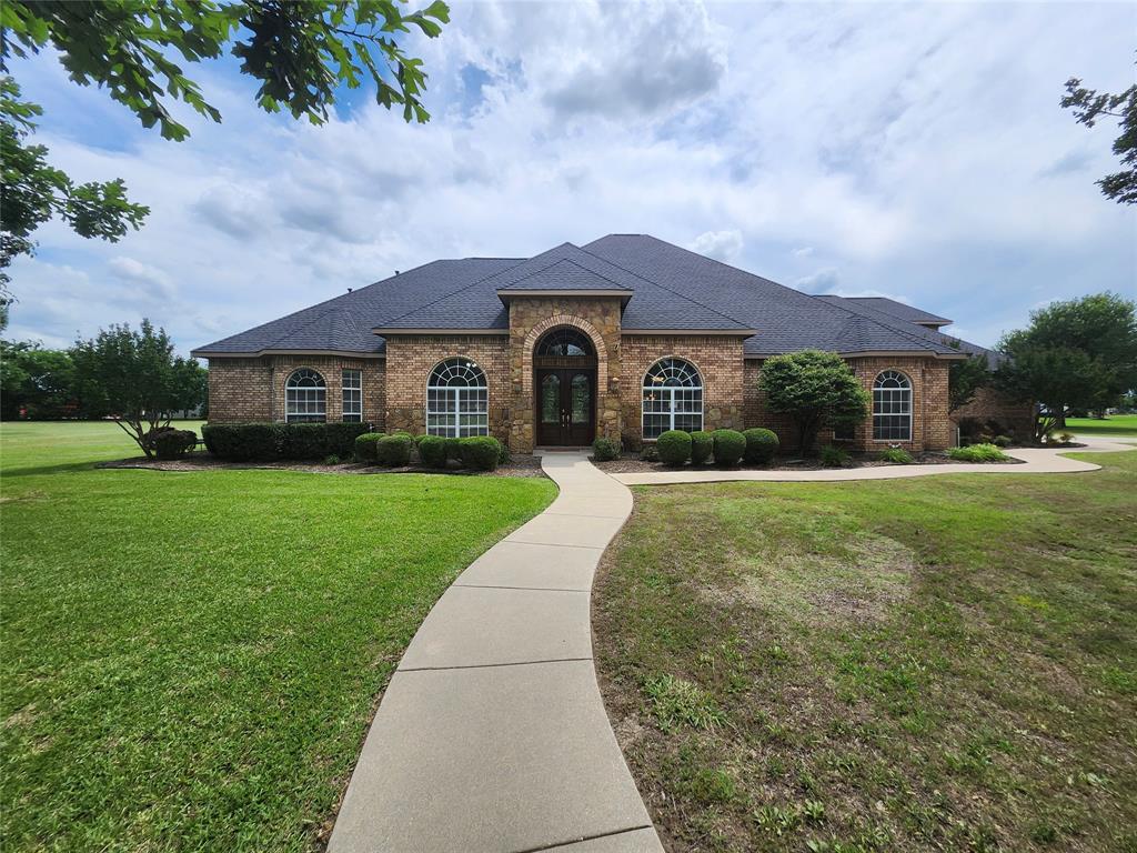 Beautiful Quality Custom Home. Walk in through your double entry doors to a spacious foyer that leads to an open living space complete with a wall of builtin entertainment center and fireplace with windows overlooking the backyard. Chef's kitchen features 5 burner Viking gas cooktop, tons of cabinets and counterspace including an island. Two spacious dining areas, both convenient to kitchen. Front office off the entry with builtins and french doors. Retreat to a private bedroom with gaslog fireplace, jetted tub, huge 7X9 walk in closet with builtin chest of drawers and seasonal racks, door to covered patio. Split bedroom layout offers privacy and versatility in a great floorplan. Large upstairs gameroom with it's own HVAC system! Recent Hail Resistant Roof and gutters. Oversized three car garage has half bath and small office room that are air conditioned! Zoned HVAC, 3 units! Large covered patio with two ceiling fans offers a great place to spend time outdoors. What would you do with the over 1.3 acres? So much opportunity to make this place your own custom home. Great location, schools, and short drive to shopping, restaurants, and more. Information deemed reliable but not guaranteed. Buyer should verify schools, etc.