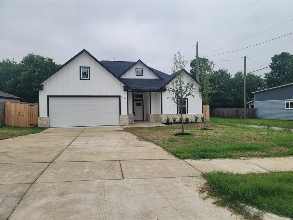 Beautiful new construction on a corner lot, featuring 3 bedrooms, 2 bathrooms, a dedicated study—perfect for a home office or flex space, laundry and mud room with 2 pantries. Beautiful new construction on a corner lot, featuring 3 bedrooms, 2 bathrooms, a dedicated study—perfect for a home office or flex space, laundry and mud room. Beautiful wood-grain tile flooring runs throughout the home. Spacious living room with a herringbone- tiled gas fireplace perfect for relaxing or entertaining. Each bedroom offers generous space, spacious closets with ceiling fans in each room. The primary luxurious ensuite suite with dual sinks, custom tile work with a large walk-in closet. Open kitchen design featuring double-stacked white cabinetry with black accent hardware, granite counter tops, modern lighting, with stainless steel appliances. Additional features include an oversized garage, central air, extra pantry space.