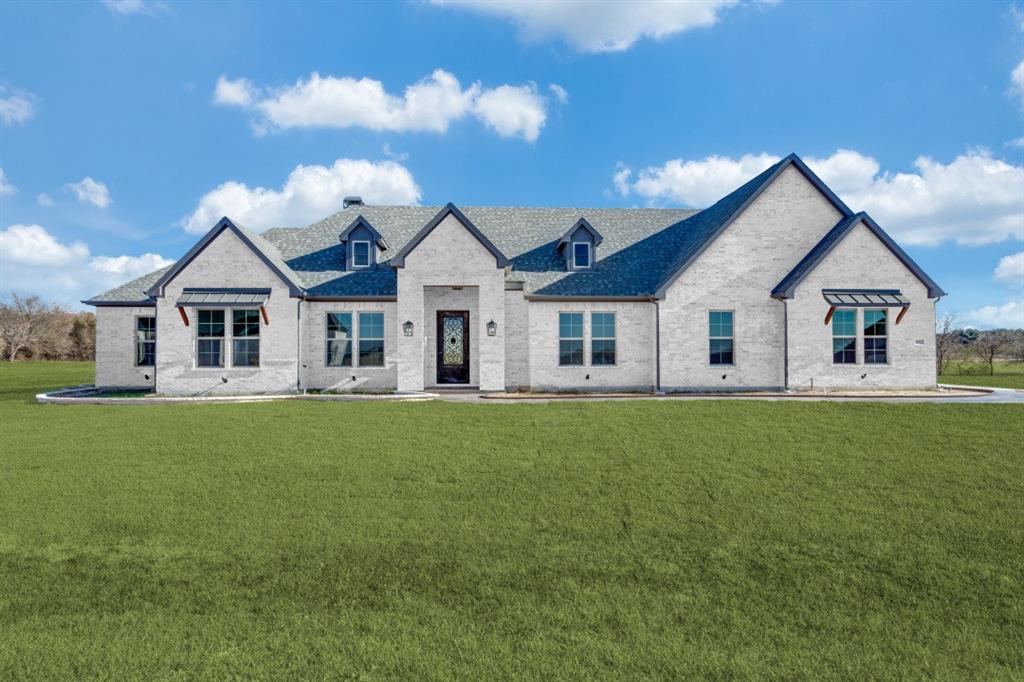 Indulge in refined luxury living in Prairie Hill Phase 2, one of Aledo’s most thoughtfully planned neighborhoods, located within the award-winning Aledo ISD. This custom-designed home offers a thoughtfully crafted layout with a seamless connection between indoor and outdoor living, highlighted by a striking wall of sliding glass doors.

The open-concept floor plan features 4 bedrooms, a private study, and a spacious game room, showcasing exceptional craftsmanship and elevated finishes throughout. Buyers have the opportunity to collaborate with a well-established, highly respected builder to personalize the finish-out, creating a home that blends timeless elegance with everyday functionality.

Prairie Hill Phase 2 represents the next chapter of this sought-after community, offering an enhanced setting while maintaining the character and charm that make Prairie Hill so desirable. Estimated build time is approximately 4–6 months from slab pour.
(Photos shown are representative of elevation and floor plan and may include upgrades not included in the base price.)