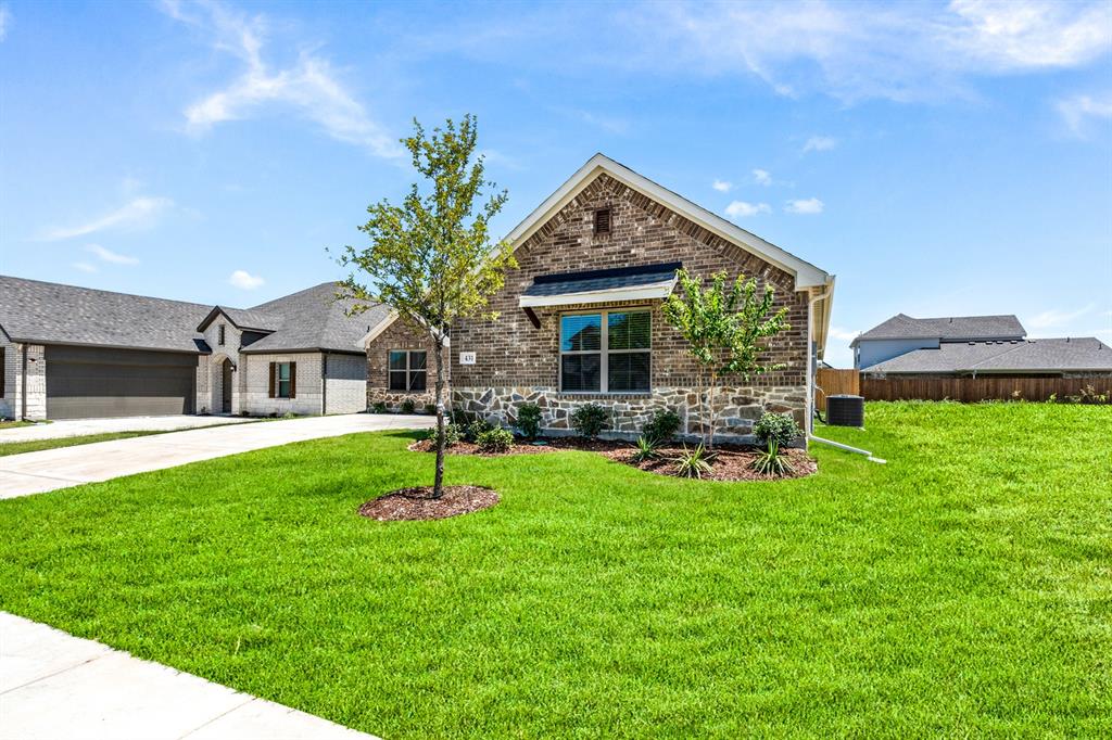 MLS# 21202489 - Built by Altura Homes - Ready Now! ~ Altura Homes Features Summerwood Estates a 50ft and 60ft Planned thriving community with direct access to I-35 freeway movie theater- grocery - and restaurants. The Logan B floor plan features 4-2-2 in a single-story side entry garage with 4 sides ACME Brick & Stone full landscaping package with full gutters and sprinkler system. Upon entry this is a full open floor plan with a open living and dining area with full view to back  very large, covered patio. Kitchen has 42in cabinets with granite countertops and stainless-steel appliances flooring has luxury vinyl floors in main area with split bedrooms from owner's retreat shows full bedroom with walk in tub and separate shower dual vanity sinks and Walkin closet, secondary has its own full bath.