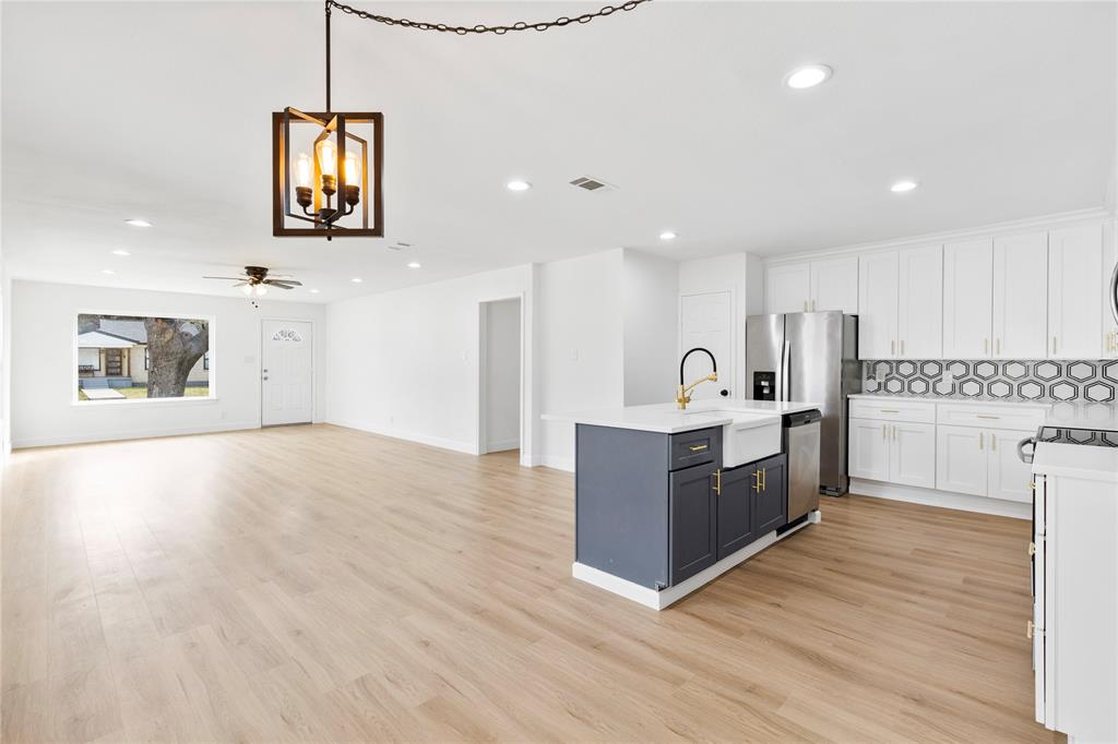 Located in the heart of the Kiest Park neighborhood, 3309 Tennessee is a beautifully maintained home within walking distance of Kiest Park and just minutes from the Bishop Arts District and Downtown Dallas. 

Offering more than 2,000 square feet of living space, including a flexible floor plan with four bedrooms, two bathrooms, a dedicated office, and a versatile bonus space that would make an ideal media area, library, sitting area, or play space.

The updates are endless, including brand new luxury vinyl plank flooring throughout, updated light fixtures, fresh paint and much more. Expansive windows fill the home with natural light, creating a bright and inviting atmosphere. At the heart of it all, the kitchen features quartz countertops, shaker style cabinetry, stainless steel appliances, abundant storage, and a spacious island that serves as the centerpiece for everyday living and entertaining.

The spacious bedrooms provide comfort for family and guests alike, each offering generous closet space. Both bathrooms have been completely renovated with stylish finishes, creating clean, timeless spaces that complement the home's modern updates.

The spacious two car garage includes an EV charging station and additional storage, while the porte cochère provides even more covered parking. Step outside to enjoy the charming side courtyard, a great space to relax or entertain. Additional updates include a newer roof, solar panels, and a tankless water heater.

With thoughtful updates, flexible living spaces, and an exceptional location in North Oak Cliff, 3309 Tennessee offers the charm of the Kiest Park neighborhood with easy access to Downtown Dallas, Bishop Arts, and everything North Oak Cliff has to offer. Schedule your private showing today.