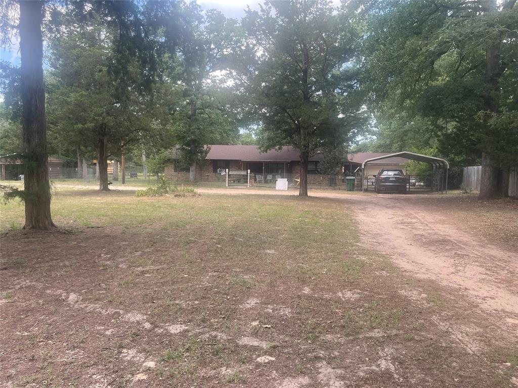 BEAUTIFUL QUIET ACREAGE, 2.3 ACRES ,  WOODED,  NO RESTRICTIONS !!! HOME SITS BACK OFF ROAD, 3 BEDROOMS, 2 BATH, 2.5 GARAGE, 2 CAR CARPORT, ALL ELECTRIC, WELL WATER , BARN, CHICKEN HOUSE, REPLACED ROOF IN 2023, CONVENTIONAL SEPTIC SYSTEM REPLACED 2024, HVAC REPLACED 2023, FULLY FENCED, DISHWASHER REPLACED, RANGE REPLACED,  KOI POND,   RENTAL MOBILE PROPERTIES WILL BE REMOVED BEFORE CLOSING UNLESS BUYER WANTS, MASTER BATH IS BEING UDATED NOW, 
SCHOOL BUS IS USED FOR STORAGE, THIS MINI RANCH PROPERTY IS SUCH A GREAT SPOT  !!!!  DONT MISS OUT ON IT !