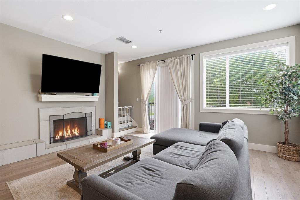 Welcome to your new favorite place to call home. This beautifully built two-bedroom, two-and-a-half-bathroom condo offers 1,260 square feet of thoughtfully designed living space that checks all the boxes.

Step inside and you'll immediately notice the high ceilings and gorgeous hardwood floors flowing throughout the entire unit. The open concept layout makes everything feel spacious and connected, perfect for entertaining friends or just kicking back after a long day. The kitchen is a real standout with granite countertops, a gas range, and quality finishes that show the care put into every detail of this build. Plus, the refrigerator and washer and dryer are already included, so you can skip the appliance shopping.

The tankless hot water heater is one of those smart upgrades that keeps things efficient and reliable. You'll also appreciate the safe and secure building, giving you peace of mind whether you're home or away. And here's a nice bonus — water is included in the homeowners association dues.

Investors, take note. This condo is a strong candidate for rental income, sitting within walking distance of popular spots like Spice and Maggie's RnR on Magnolia Avenue. The Fort Worth train station is just a short trip away, and you're minutes from Downtown Fort Worth, Dickies Arena, and the world-renowned Kimbell Art Museum. The neighborhood vibe is vibrant and walkable, which renters absolutely love.

Whether you're looking for a stylish personal residence or a smart investment property, this one deserves a serious look. Schedule your showing today and see it for yourself.