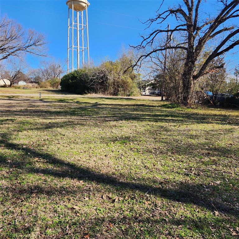 Lake lot located near Lake Tawakoni in East Tawakoni Whispering Oaks Subdivision. Small lake view at back of lot in the winter time. . Walking distance to lake and boat ramp just 1 block away. Restricted to site built only. All information is approximate,buyer and buyers agent to verify.  City of East Tawakoni is no longer installing water meters until furthur notice. If building, it will be delayed for unknown time.