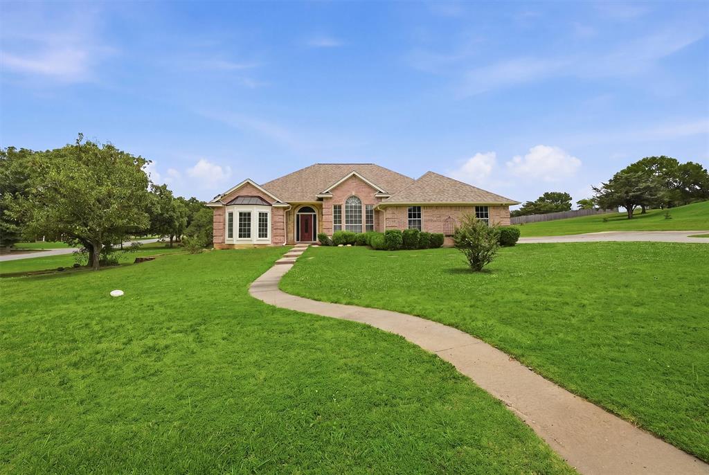 Custom built home on a peaceful 1 acre lot in Bells, Texas. This property boasts and open floor plan, featuring spacious family room with fireplace and built-ins, a breakfast bar, and abundant kitchen cabinets. The master suite includes his and her dressing areas, luxurious shower, and a garden tub. With three bedrooms, two full bathrooms, this home offers comfortable living spaces. Enjoy outdoor gatherings on the covered back deck, overlooking the serene surroundings. And oversized 2-car garage provides ample storage. Experience the tranquility of country living while still being conveniently close to town. Come and make your updates and call it Home!