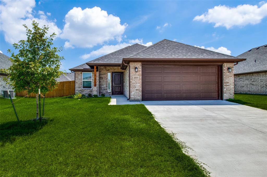 ****ONE MONTH FREE RENT!!!**** with 18-month lease.  Ask agent or property manager for details.  This never been lived in home has 3 bedrooms, 2 baths and a 2-car garage.  Covered front and back porches.  Large kitchen has open concept into living room.  Refrigerator provided.  Master bedroom has HUGE walk-in closet.  Granite Counters in kitchen and bathrooms, TONS of storage, maple cabinets, SS appliances, 2-inch faux wood blinds, brushed nickel fixtures, full sod and vinyl wood flooring throughout.  NO CARPET!!  Close to Austin College, Texas Instruments and Globitech.  Walking distance to Sherman High School.
