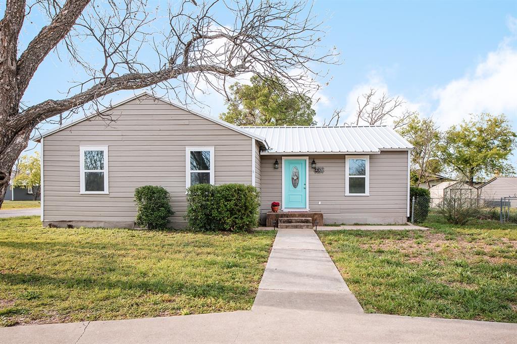 This cute home on Pearl Street is an updated 3 bedroom and 2 full bath home that seamlessly blends modern updates with timeless charm. The heart of the home is the stunning gourmet kitchen, complete with two sinks, sleek new stainless steel appliances, and a built-in beverage cooler, ready for all the for entertaining or casual family living. 
This home showcases both original and new real hardwood flooring and a pleasant light paint palette, creating a warm and inviting atmosphere throughout. Enjoy peace of mind with all-new electrical and plumbing systems, and take advantage of the detached garage for extra storage or parking. A new metal roof was installed in 2025, so the efficiency of this home is improved from top to bottom! Perfect for any season and appealing at multiple price points, don't miss this one!