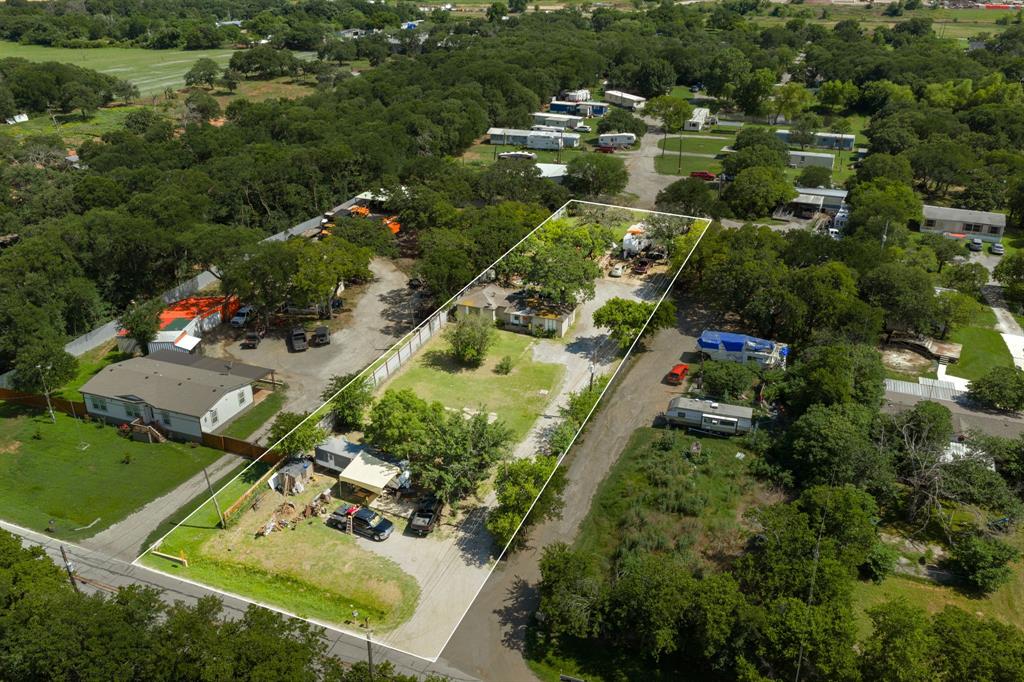 BACK ON MARKET DUE TO BUYERS FINANCING**** INVESTOR SPECIAL! Rare opportunity to own 1.23 acres featuring four addresses: 5150, 5152, 5154, and 5156 Wilson Rd. This unique income-producing property offers multiple revenue streams with established rental history already in place. Property is currently generating approximately $1,500 per month in gross rental and utility reimbursement income from existing occupants. Multiple structures, separate addresses, individual mailboxes, and separately metered utilities provide flexibility for a variety of investment strategies. Adjacent to an established RV park, this property offers immediate cash-flow potential with additional upside for investors seeking value-add opportunities. Whether you’re looking to expand your rental portfolio, hold for income, or explore future possibilities, properties with this combination of acreage, multiple addresses, and existing income are difficult to find. Property sold AS-IS. Buyer to independently verify all information, including measurements, zoning, permitted uses, utilities, and income potential.