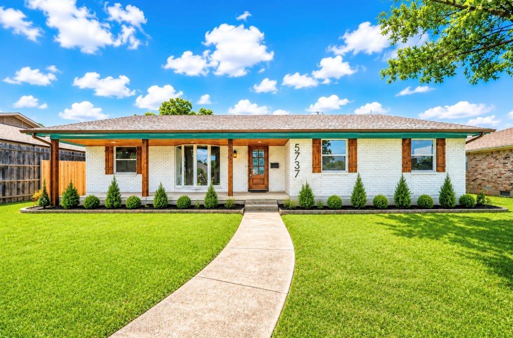 $5,000 Preferred Lender Incentive Available! Welcome to this beautifully renovated single-story home where timeless charm meets modern comfort in a prime Dallas location. Thoughtfully updated throughout, this move-in-ready home offers an open-concept layout designed for both everyday living and effortless entertaining. The spacious living room features a classic brick fireplace, abundant natural light, and seamless flow into the dining and kitchen areas. The remodeled kitchen showcases modern finishes, ample cabinetry, and generous workspace, making it perfect for cooking and gathering. The private primary suite serves as a relaxing retreat with a beautifully updated ensuite bath featuring designer-inspired finishes. Additional bedrooms provide flexible space for family, guests, a home office, or hobbies. Luxury vinyl plank flooring and stylish ceramic tile extend throughout the home, offering durability and a clean, contemporary feel. Fresh updates inside and out create a bright, inviting atmosphere while maintaining the home's classic character. Situated on a generous lot, the backyard offers plenty of room for entertaining, pets, gardening, or future outdoor living enhancements. An attached two-car garage provides added convenience and storage. Combining quality renovations, functional living spaces, and timeless appeal, this home is ready for its next owner. Buyer incentive: Receive a $5,000 lender credit when financing through the seller's preferred lender (subject to lender approval and program guidelines). Note: Some photos have been virtually staged, while others feature physical staging to showcase the property's design potential and help buyers visualize the home's possibilities.