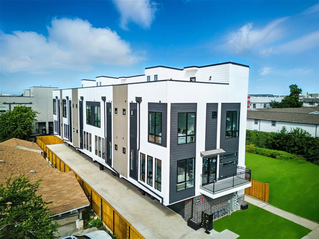 UNBEATABLE INVESTMENT PROPERTY IN PRIME LOCATION WITH 5 UNITS, ROOFTOPS , AND SPACIOUS LIVING SPACES. Welcome to Fairmount Townhomes situated in the vibrant heart of Medical District, this remarkable new construction townhome features 2 bedrooms, 2.5 baths, and an inviting blend of contemporary and modern luxury. Inside, you’ll enjoy an open floor plan with spacious rooms, all quality vinyle flooring , and Calacatta quartz countertops in a beautifully designed kitchen complete with a modern backsplash, elegant ironwork in the living area, and premium stainless steel appliances, including a double-door refrigerator. Each bathroom, including the half bath, showcases stylish tile work, adding a sophisticated touch to the home’s design. Both bedrooms offer generous space and comfort, while the private, enclosed backyard provides an ideal retreat. The showstopper is the expansive rooftop deck on the third level, offering a stunning, direct view of Downtown Dallas—perfect for entertaining or relaxing. Don’t miss out on this incredible property that combines style, space, and a prime west Dallas location!