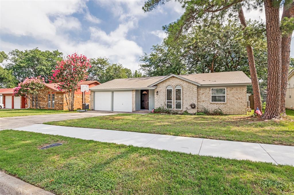 Great Opportunity! Move in ready 3 bed 2 bath home centrally located in Arlington within walking distance to California Lane Park with a splash pad, pond, and walking trails! This home has been well cared for and has had many updates within the last several years including the hvac system, windows, water heater, carpets in the bedrooms, and a remodeled bathroom in the primary suite! Vaulted ceilings in the living room with built ins and a beautifully updated electric fireplace with a mantle. Great sized backyard with a covered back porch! Great location convenient to schools, dining and shops! This is a great home that is ready for its new owner!