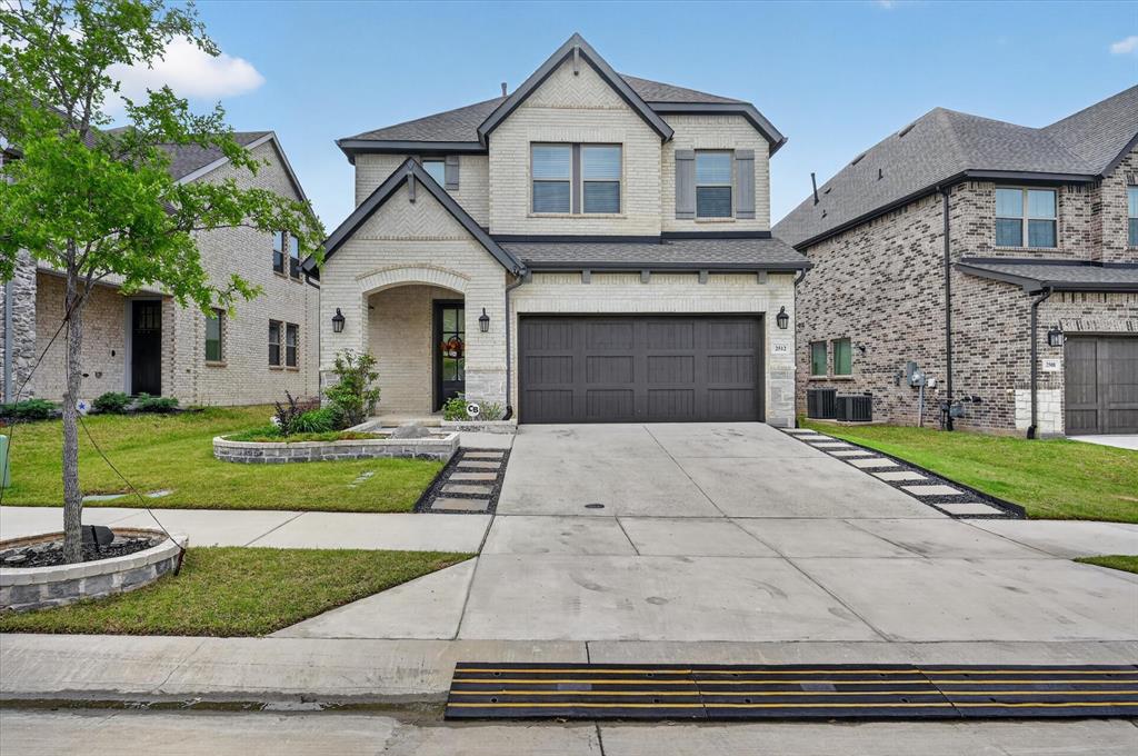 Welcome to this beautifully designed 2022 David Weekley home in the highly sought-after Parker Place community, where modern style meets everyday functionality. This spacious 4-bedroom, 3.5-bath residence features an open-concept layout filled with natural light, enhanced by upgraded luxury vinyl plank flooring that flows seamlessly throughout the main level and up the staircase. The heart of the home is a stunning kitchen showcasing quartz countertops, a large island, upgraded hardware, and abundant cabinetry—perfect for both entertaining and daily living. The main floor also includes a dedicated dining room, private office, and a convenient half bath. The primary suite offers a true retreat, complete with a sitting area and a spa-inspired bath featuring a garden tub, separate sunken shower, dual vanities, and a spacious walk-in closet. Upstairs, you’ll find well-appointed secondary bedrooms along with an oversized game room, ideal for relaxing or hosting guests. Thoughtful upgrades continue throughout, including custom tile work in the laundry and primary bath, decorative lighting, smart home features, and a solid wood garage door. The home is equipped with high-speed fiber internet, CAT6 wiring, and coaxial prewiring for seamless connectivity. Built with 2x6 exterior walls, the home offers enhanced insulation and improved energy efficiency.
Step outside to a low-maintenance backyard featuring turf and a covered patio—perfect for year-round enjoyment. As original owners, the sellers have meticulously maintained the home. Located within Lewisville ISD, with access to Hebron High School and walking distance to the Technology, Exploration & Career Center East, Killian Middle School, and Independence Elementary, and just minutes from shopping, dining, and major highways, this home offers the perfect blend of comfort, convenience, and elevated living. HOA amenities include landscaped open spaces, an entry feature, and a playground. Schedule your showing today!