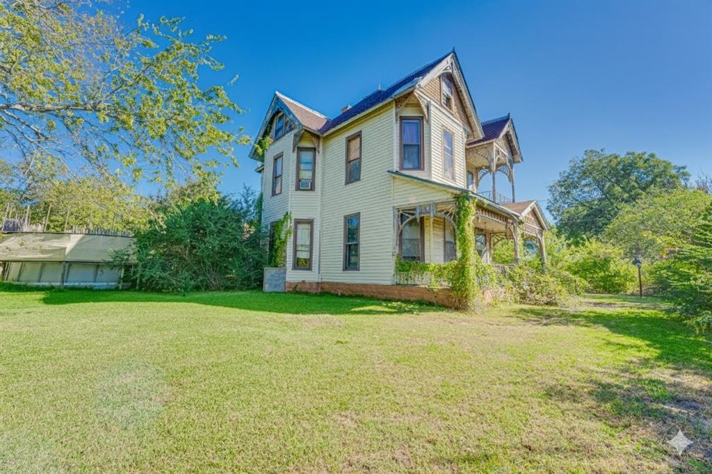 Step back in time with this 1898 Victorian home offering 4,112 square feet across four spacious levels. Featuring 4 bedrooms and 3 full baths on an oversized lot, this property showcases original woodwork and hardwood floors throughout, rich with character and timeless charm.

While the home will require significant restoration, it presents an incredible opportunity for someone with vision to revive and customize a true historic gem. Adding to its appeal, a brand-new lake is currently being filled nearby, with a boat ramp planned less than two miles from the home, bringing future recreational value and lifestyle potential right to your doorstep.

A rare chance to own a piece of history with exciting growth and possibilities ahead.