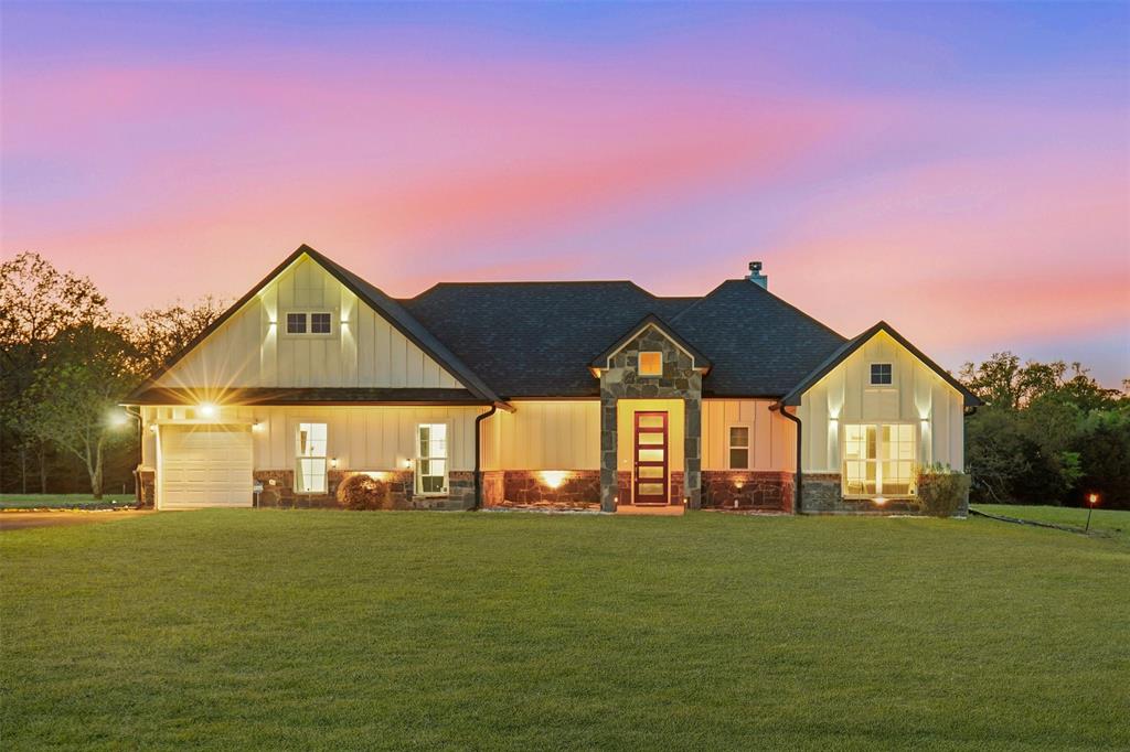Experience luxury living in this better-than-new home nestled in the highly sought-after Eagle Shores community on Lake Bob Sandlin. Boasting a generous 3.7-acre lot, this property offers some of the most mesmerizing views in East Texas. The open floor plan creates a perfect setting for entertaining, while the Chef's Kitchen is a culinary masterpiece featuring high-end GE appliances, exquisite countertops, abundant storage, and generous pantry space. The oversized master suite includes a lavish ensuite bath and a spacious walk-in closet. Additionally, a versatile bonus space awaits, perfect for an extra-large guest suite, game room, theater space, just to name a few. Step outside to a dreamy outdoor space with an inviting fireplace and covered dining area, all set against the backdrop of beautiful lake views. HUGE BONUS- sold with most furnishings and accessories. Priced to sell, this property is a rare gem offering unparalleled comfort and style in a coveted lakeside location.