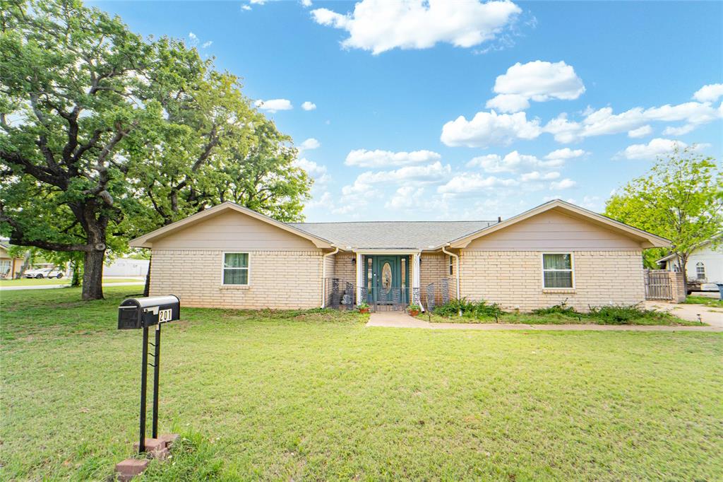 2,256 sq ft home in a desirable neighborhood featuring 3 bedrooms and 2 baths. The family room offers a wood-burning fireplace, built-ins, and opens to the kitchen for easy living and entertaining. A separate living area provides added privacy by dividing the bedrooms from the main living space. Spacious primary suite and well-sized guest rooms. Recent high-dollar updates include a new HVAC system and double-pane windows with a transferable lifetime warranty. Additional updates include new flooring, updated bathroom vanity and fixtures, new appliances that will convey, and a new water heater. Most of the furniture will also come with the home. Large fenced backyard with double gate access to garage, covered patio, and storage building completes this move-in ready home.