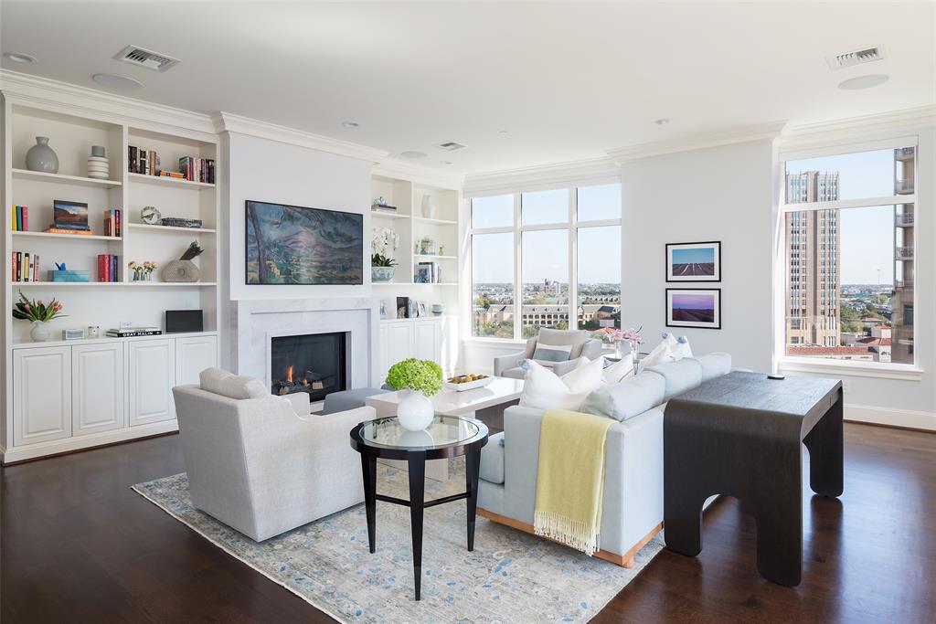 Indulge in opulent living in this freshly renovated two bedroom condo at the prestigious Ritz Carlton Residences. This luxurious abode features a newly transformed kitchen with the latest appliances, radiating a light and bright ambiance that complements the transitional design. The spacious living area with gas fireplace & beautiful built-ins creates a magnificent entertaining space. Additional highlights include: hardwood & marble floors, electric shades, guest suite with Murphy bed and spacious primary suite with a white marble clad bath. With world-class amenities and breathtaking views, this residence offers the epitome of upscale urban living. Ritz amenities include a resort style pool, fitness center, wine cellar, 24 hour valet & concierge and hotel services including in room dining. With a ideal location in vibrant Uptown, you can walk to dozens of shops & restaurants, Klyde Warren Park, the Arts District & American Airlines Center. Available fully furnished for $2,995,000.