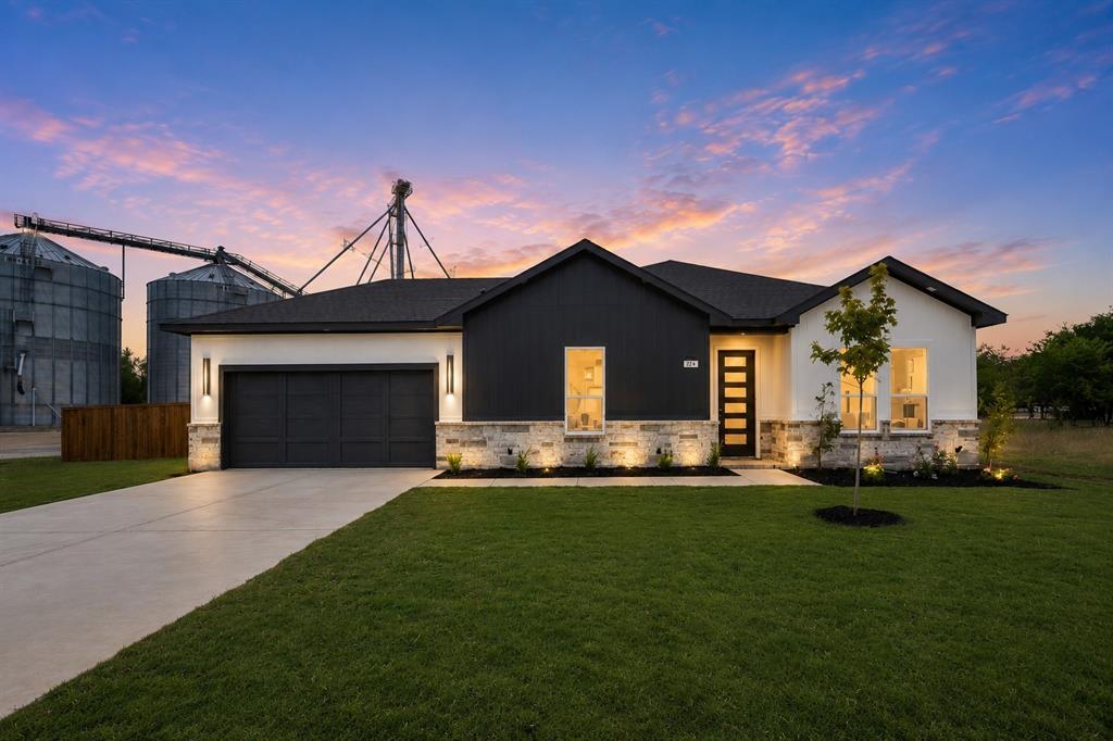 Welcome Home! Imagine pulling into your 2-car garage, stepping inside your brand-new home, and ending the day relaxing by the warm glow of your fireplace.

Built by A&B Custom, this beautifully crafted new construction home offers 3 bedrooms, 2 bathrooms, a 2-car garage, and approximately 1,300 square feet of thoughtfully designed living space. From the moment you enter, you'll appreciate the quality finishes and attention to detail throughout. The open-concept layout features beautiful hardwood floors, quartz countertops, custom cabinetry, stainless steel appliances, an oversized island, tray ceilings, spray foam insulation, and a modern electric fireplace that serves as the perfect gathering place for family and friends. The spacious primary suite provides a private retreat with dual vanities and a beautifully tiled walk-in shower. Outside, the covered back patio offers the ideal setting to enjoy your morning coffee, host guests, or unwind after a long day. Conveniently located near schools, shopping, dining, and all that Hillsboro has to offer, this home combines modern style, energy-efficient features, and everyday comfort.

Homes with this level of craftsmanship, hardwood flooring, a 2-car garage, and custom finishes at this price point are a rare find. Schedule your private showing today before this opportunity is gone!