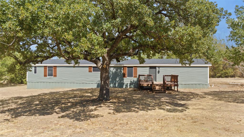Completely updated, charming manufactured home on 2.5  treed acres.   Features include:  new roof, new HVAC, new appliances, new floors, new paint, new fixtures and much more.   This property is being surveyed out of a larger property.  Adjacent property also for sale, MLS # 20428816, or the whole property at 20428894.