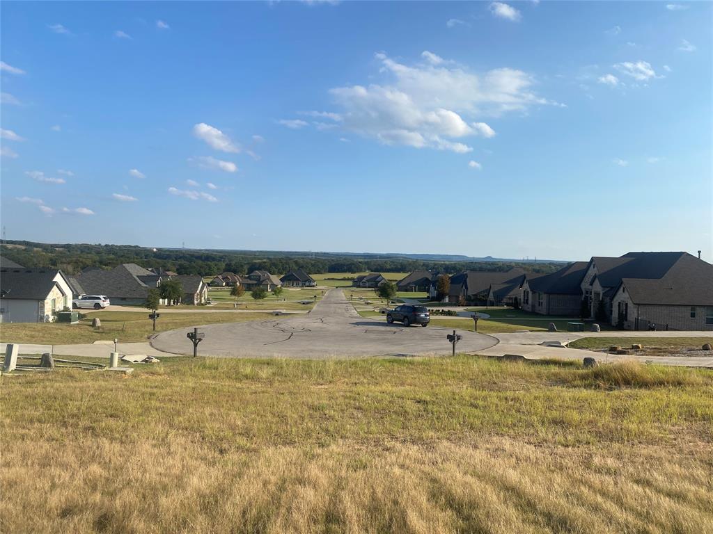 Looking for the perfect lot to build your dream home in Granbury—recently named the best historic small town in America?
This beautiful cul-de-sac homesite in the premier gated community of Rolling Creek Ranch offers spectacular sunrise views, peaceful surroundings, and the ideal setting for your custom build.
Rolling Creek Ranch features exceptional amenities, including a 17-acre community park, sports field, basketball and pickleball courts, and a covered pavilion for neighborhood gatherings and events.
Located just 15 minutes from Granbury’s historic square, you’ll enjoy quick access to acclaimed restaurants, boutique shopping, live music venues, and the many festivals and events that make Granbury the Celebration Capital of Texas.
An adjacent, nearly identical lot owned by the same seller is also available—purchase both for outstanding value. Even better, receive a 5% rebate on your lot purchase(s) when you choose Gemini Homes to build your new custom home.