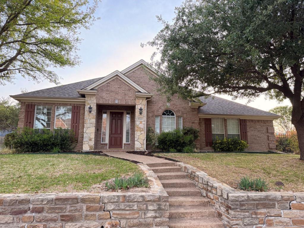 Welcome to 2185 Clubview Dr in the highly popular Shores community of Rockwall! This open floor plan 1.5-story home offers approximately 3,083 sq ft with a versatile floor plan featuring 3–4 bedrooms, 2.5 baths, a dedicated study, formal dining, and an upstairs bonus room or optional 4th bedroom.

The open-concept layout is perfect for both everyday living and entertaining, highlighted by rich wood flooring and a stunning stone fireplace with gas logs in the spacious living area. The kitchen offers abundant cabinetry, generous counter space, and a large center island, seamlessly flowing into the main living and dining areas.

The private primary suite is located on the main level and features a spacious layout with a large en-suite bath. Two additional bedrooms are also downstairs, while the upstairs flex space includes a large walk-in closet—ideal for a game room, guest suite, or media room.

Situated on a desirable corner lot, the home also features an oversized garage and great curb appeal. Enjoy all the amenities The Shores has to offer, including a community pool, clubhouse, golf course, and scenic surroundings. Conveniently located near shopping, dining, and Rockwall ISD schools.

Don’t miss this opportunity to own a spacious and well-appointed home in one of Rockwall’s premier neighborhoods!