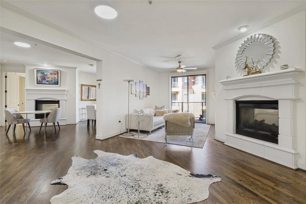 Experience timeless elegance at The Sorrento on Turtle Creek. An amazing, boutique, 5 story lock and leave in the heart of Preston Hollow.
This enhanced single level 1.943 sq ft 3 bedroom, 2.5 bath residence offers two large suites with walk in closets, as well as a flexible third bedroom with double doors, perfect as an additional bedroom or private office. Natural light abounds and fills the living spaces. Two double sided fireplaces make for a cozy and warm atmosphere. This unit has an enviable location with two patios that overlook the infinity edge pool and fireplace. New motorized blinds and custom shutters in the living areas and bedrooms. The chef's kitchen with stainless steel appliances features a large island, breakfast bar, wine cooler, warming drawer, stone countertops, and updated lighting. Hardwood floors in the main areas and carpet in the bedrooms. Two newer HVAC's and water heaters provide added efficiency. A special bonus, This unit includes a large storage area and three parking spaces,  two of which are located near the elevators. HOA covers most utilities, keeping ownership simple and low maintenance. A custom Concierge takes care of security and makes sure all guests are well taken care of. There have been Several updates to the building, including roof, pool, Fire Suppression system and more. The HOA fee covers several monthly bills. Electricity is the owner's responsibility and remains impressively low, even in peak summer months. Premier amenities, concierge services, private keyed entrances, an infinity pool, business center, coffee lounge, a private terrace with downtown views, and a large fitness, center are all included, as well as planned social events for the owners. Exceptional security, close to shopping, top dining, and major freeways, this one truly has it all!