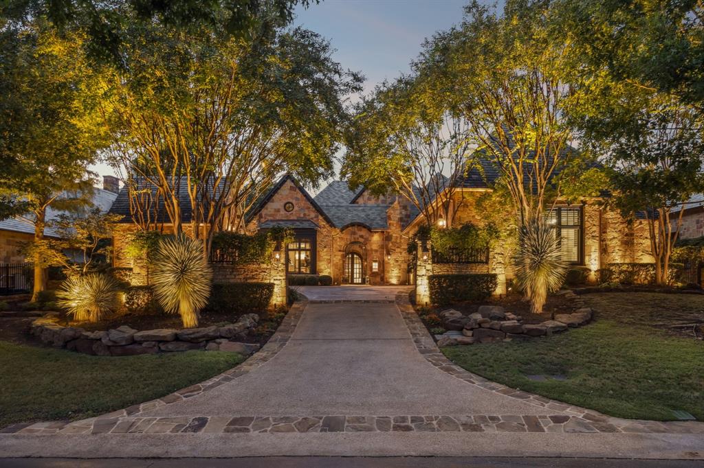 Welcome Home to this Custom Villa in the coveted Vaquero Guard Gated neighborhood! This exceptional Villa backs the scenic 8th fairway of the acclaimed Vaquero Golf Course! White, light & bright spaces are beautifully balanced with wood floors & organic elements. This Custom home offers the perfect blend of luxury, elegance, privacy & functionality. Enter thru the serene Courtyard to a thoughtfully updated interior with rich warm wood flooring, designer finishes & an expansive Open Floor Plan ideal for both everyday living & entertaining. The stunning Kitchen is a Chef’s dream with abundant cabinetry, leathered countertops, a full-sized + an oversized SS sinks, Viking range + Sub-Zero refrigerator. The open Bar with floating shelves + show-stopping custom Temperature-Controlled glass Wine Room elevate the space with effortless sophistication. The Open Plan Dining and spacious Family Room with cast stone fireplace have lovely backyard views. A well-appointed Executive Study w full bath is a tranquil space to work. The versatile downstairs Media Room (or 2nd office) makes this a flexible layout. Upstairs enjoy a Game Room with wet bar, 2 private Bedroom suites + an expansive walk-in Attic with garage lift access. Outside is your own private resort! The lushly landscaped backyard boasts a sparkling Pool, cascading Waterfall, separate Spa, covered outdoor living area + full Outdoor Kitchen—all backing a peaceful fairway with total privacy. The one-of-a-kind garage setup offers an oversized 3-car garage w workshop, additional storage, hot & cold water hose bib, garage lift system + a separate detached Golf cart-sports car garage. Three brand new HVAC units + recently replaced H20 heaters make this home move-in ready!! JUMP the GOLF WAITLIST to PRIORITY GOLF STATUS - Buyer must be approved thru the Club. Rare opportunity to own in one of DFW’s most exclusive communities. Experience the Vaquero lifestyle at its finest. Students can attend Westlake Academy or Carroll ISD!!