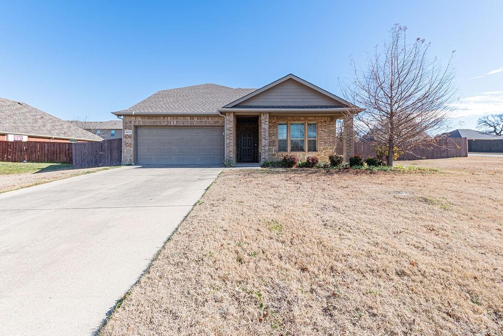 Welcome Home to 6811 Gamecock Court!!! Discover the perfect blend of traditional craftsmanship and thoughtful customization when you enter this home. Situated on a premium, oversized corner lot , imagine coming home to a place that feels intentionally designed for the way you actually live. NOT a cookie-cutter build, but a home with personality, space, and flexibility. 
As you step inside, the open floorplan immediately invites connection. Whether it’s hosting friends in the living area, cooking while staying part of the conversation, or enjoying quiet mornings with natural light pouring in, the flow just works. The split-bedroom layout offers privacy when you need it, while the walk-in utility room keeps daily life organized and out of sight.
This home adapts to you. Four bedrooms OR the option for a dedicated home office space to grow, work, and unwind without compromise. Then upstairs, a whole new experience awaits. 
A private suite with a full bedroom and bathroom alongside a generous bonus or game room. It’s perfect for visiting family, overnight guests, or creating a space that’s truly your own. This is where it stands apart! EVERYWHERE you look, you’ll notice custom upgrades chosen with care. The kind of details that make you pause and think, this feels different. This is not your standard new construction.
Outside your front door, convenience takes over. Everyday amenities are just minutes away, with four school options within less than a mile. And when life gets busy? Even groceries can arrive by Walmart drone delivery, landing while you relax comfortably at home.
This isn’t just a house. It’s a lifestyle designed for comfort, flexibility, and modern living. Once you walk through it, you’ll understand why it feels like home.
The sellers also built a new fence.