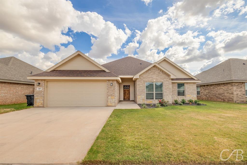 This stunning home boasts high ceilings, ranging from 9 to 10 feet, throughout the living, dining, and kitchen areas. The large windows flood the space with natural light, illuminating the luxurious wood-look tiles, while plush carpeting graces the four spacious bedrooms. The gourmet kitchen is a chef's dream, featuring exquisite granite countertops, a convenient breakfast bar, and custom soft-close cabinets. The primary suite is a true retreat, offering a relaxing garden tub, double sinks, a separate shower, and not one, but two walk-in closets. Situated near Wylie East Elementary and Jr. High, this home also includes a fenced backyard, perfect for outdoor enjoyment. Call today to view this gorgeous home! All residents are enrolled in the Resident Benefits Package (RBP) for $50.00 per month which includes liability insurance, credit building, up to $1M Identity Theft Protection, HVAC air filter delivery (for applicable properties), on-demand pest control and much more!