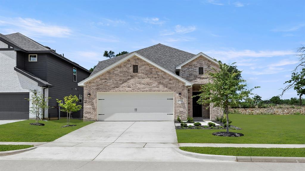 MLS# 21286092 - Built by HistoryMaker Homes - Jul 2026 completion! ~ **Choose your rate with up to $30,000 to spend your way** Welcome home to this stunning 4-bedroom, 3.5-bath home designed for both comfort and entertaining! From the moment you arrive, you’ll be greeted by a charming front porch and beautiful curb appeal. Inside, the open-concept layout features gorgeous flooring throughout the main living areas, plush carpet in the bedrooms, soaring vaulted ceilings, and  staircase that creates a grand first impression. The private study with elegant French doors is perfect for working from home or creating a quiet retreat. The spacious family room flows seamlessly into the kitchen and dining area, making gatherings effortless. Upstairs, a large game room provides the perfect space for movie nights, game days, or family fun. Relax in the luxurious primary suite featuring a spa-inspired bath with a separate tub and shower, plus a large walk-in closet. Step outside to enjoy the covered back patio, ideal for outdoor entertaining year-round. This home truly has it all!