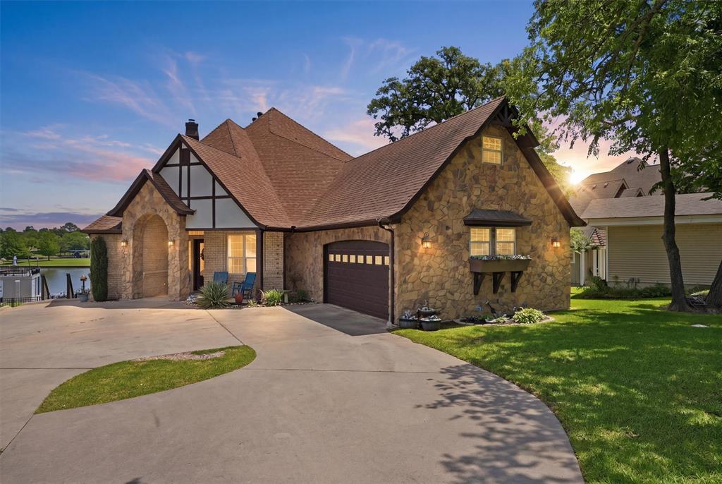 Drive through the gates of Lake Kiowa and feel your worries drift away!

1211 Kiowa Drive West is a beautifully remodeled waterfront home with sweeping lake and golf course views. The spacious layout includes two first-floor primary suites with lake views, including the main suite with direct access to the deck overlooking the backyard, pool, and water.

The downstairs living area features a soaring two-story ceiling, fireplace, built-ins, and double doors leading to the deck. The kitchen is open to the living area by way of a breakfast bar and includes new quartz counters, built-in refrigerator and freezer, double oven, gas range, and wine fridge. Multiple pantries, storage closets, and an oversized utility room add excellent function. A breakfast area with built-ins and a formal dining room provide great space for gatherings.

The larger primary suite features bay windows, a tray ceiling, recessed lighting, and ceiling fan. The en suite bath includes two spacious vanities, seated makeup area, slipper tub, separate shower, generous storage, and a large walk-in closet. A private office with built-in cabinets and desk is also located within this suite.

Upstairs offers a huge bonus room with separate HVAC, additional living space, two bedrooms, and a balcony with retractable screens. Outside you’ll find a resort-style pool and spa with decking, separate fenced dog area, and multiple seating areas. The dock includes a boat lift, double jet ski lift, and built-in retractable boat cover.  An oversized garage allows for additional storage or room for a workbench.

Lake Kiowa offers a private lake, unlimited golf on an 18-hole PGA-rated course and 9-hole par 3 course, new pickleball courts, tennis, two beaches, playgrounds, great fishing, restaurant, 19th hole, pro shop, and more!

Agents, please read private remarks thoroughly.