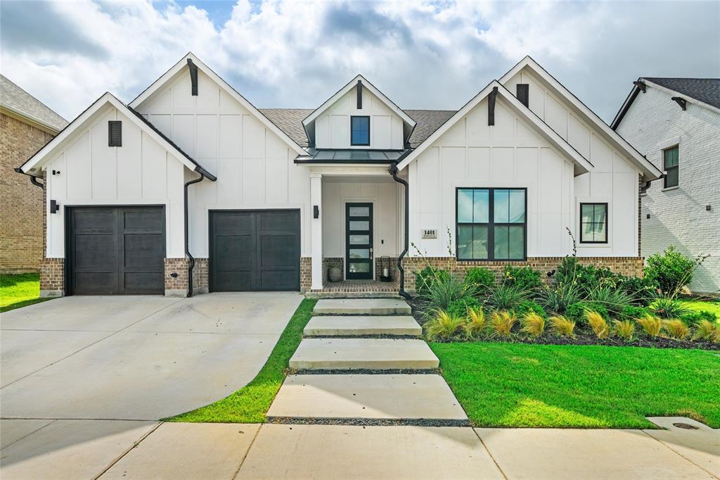 A standout Loralai model in Pecan Square, this Toll Brothers home combines rare single-story living, a premium oversized 65’ view lot, and over $150K in thoughtfully selected structural and designer upgrades.

The modern Scandinavian farmhouse exterior features black Low-E windows, architectural lighting, upgraded landscaping, and a welcoming covered front porch. Inside, an impressive entry showcases three 13’ tray ceilings with designer lighting, setting the tone for the elevated finishes throughout.

The chef’s kitchen features an 8’ island, double ovens, induction cooktop, ceiling-height herringbone backsplash, stacked cabinetry, walk-in pantry, and butler’s pantry—all flowing seamlessly into the dining and great room beneath dramatic 12’ ceilings and walls of natural light.

The private primary retreat offers a cathedral ceiling and spa-inspired bath with freestanding tub, quartz finishes, oversized walk-in shower, frameless glass, and designer details. Spacious secondary bedrooms feature walk-in closets, including a private guest suite with ensuite bath. A cathedral-ceiling office with dramatic window wall and dedicated media room provide additional flexibility.

Enjoy an extended outdoor living area with covered patio, gas connection, smart lighting, and open views. Additional highlights include upgraded designer baths, a statement powder room, custom window shades, smart lighting, security cameras, Tesla charger, premium flooring, abundant recessed lighting, and a brand-new roof.

Experience the Pecan Square lifestyle with resort-style pools, fitness center, co-working spaces, sports courts, playgrounds, dog parks, and convenient access to I-35W and Hwy 114.