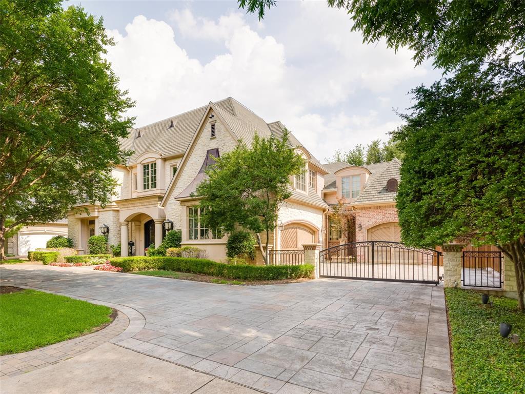 Incredible opportunity in the heart of Preston Hollow priced significantly below 2025 appraisal of $4MM.  Timeless 5-bedroom, 6.2-bath estate by Oscar Ponder on an oversized lot with exceptional scale, flexibility and enduring design. Thoughtfully designed for everyday living and effortless entertaining, the 1st floor unfolds w expansive living spaces inc formal living & dining rooms, a centrally located wet bar ideal for hosting, and family room w vaulted ceilings and a stone fireplace that opens seamlessly to the kitchen & breakfast room. A private study with fireplace provides a quiet retreat. The serene primary suite overlooks the pool and features a spa-inspired bath & oversized boutique-style custom closet. The chef’s kitchen is beautifully appointed w Sub-Zero refrigerator & freezer, Dacor 6-burner range w double ovens, Wolf double wall ovens & microwave, two dishwashers, refrigerator drawers, walk-in pantry, and an oversized marble island — effortlessly connecting to the breakfast & family rooms for modern living. Upstairs, 3 generously sized ensuite bedrooms w walk-in closets complemented by a game room & media room. Third-floor guest quarters offer exceptional privacy with a sitting area and kitchenette, ideal for multigenerational living, long-term guests, or an au pair suite. Outdoors, enjoy an expansive covered loggia with fireplace, pool and spa with water feature, mosquito misting system, and a generous grassy yard creating a true private retreat.  Behind the scenes, the home is equally impressive, featuring six HVAC systems (including a 2025 unit), three 50-gallon water heaters with recirculating pumps, a Kohler generator servicing critical systems, and a dedicated air-conditioned single-car garage. Complete with a three-car garage, Sonos sound system, security and camera system, and a prime location near premier shopping and dining, this is a rare opportunity to own a meticulously maintained Preston Hollow estate offering both substance and style.