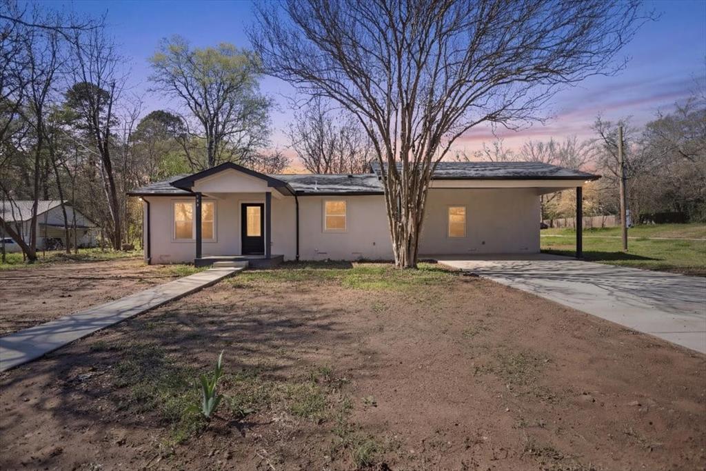 Welcome to this beautifully updated home located in Gilmer, Texas. Originally built in 1950, this property has been thoughtfully renovated to offer modern style and comfort throughout.

Inside, you’ll find granite countertops, durable vinyl flooring, and modern finishes that create a fresh and inviting atmosphere. The kitchen features all new stainless steel appliances, including a refrigerator, along with a convenient gas stove for cooking.

This home offers 3 bedrooms and 2 bathrooms with a functional layout. The primary bathroom features a tile and glass walk-in shower, while the guest bathroom includes a tile surround tub and shower combination. Recent updates also include a new roof and central heating and air system for added comfort and efficiency.

Situated on a 0.19-acre corner lot, the property also includes a carport and is conveniently located just minutes from downtown Gilmer, providing easy access to local shops, dining, and community amenities.

Schedule your showing today and see everything this beautifully updated home has to offer.