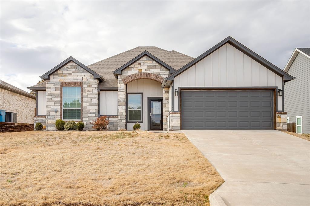 Welcome to Canyon Creek at Lake Granbury! A gated community located less than 8 miles from The Historic Granbury Square. Offering endless amenities and places the lake at your doorstep. This like-new property with modern finishes, shines inside and out with pride of ownership. Inside, you'll find an oversized entryway, open floor plan, 3 bedrooms, 2 bathrooms, eat-in kitchen, walk-in closets, and gorgeous sunroom. The split bedroom concept provides the perfect amount of privacy. Separate vanities, large shower with bench and walk-in closet make the master bedroom truly feel like a suite. In the kitchen you will find granite counter tops, beautiful white cabinets with stainless appliances and hardware. Through the laundry room you have a walk-in pantry with space for all your necessities and more. The 18 x 9 sunroom is a recent addition and the perfect space to enjoy the outdoors all year long. It has 3 sliding doors that open up the space directly to the back yard but also screens to keep the bugs away. Located off the shared space making it ideal for entertaining. French drains have been installed around the entire property. This home is move-in ready!