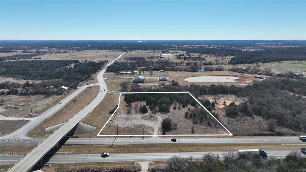 EXCELLENT OPPORTUNITY FOR THIS HARD CORNER ON US HWY 82 WITH FRONTAGE ON 82 AND ALSO ON FM 168, LOCATED APPROXIMATELY 5 MILES EAST OF GAINESVILLE, THIS TRACT OF LAND IS WITH A 3RD GENERATION FAMILY AND HAS NEVER BEEN OFFERED FOR SALE.  LOCATED IN THE HEART OF HORSE COUNTRY IN NORTH TEXAS - THIS IS A GREAT OPPORTUNITY FOR INVESTMENT, EQUINE PROPERTY, HOME, MULTIPLE HOMES, RV PARK, TRUCK STOP, FEED STORE, AND OR RETAIL ON THIS CORNER IN THE COUNTY, THE POSSIBILITIES ARE ENDLESS ON THIS HARD CORNER WITH ACCESS TO BOTH US HWY 82 AND FM 678.  WOODBINE WATER EASEMENT ON THE EAST SIDE AND METER IS AVAILABLE.  OWNER WOULD CONSIDER CONDITIONAL SHORT TERM FINANCING, CONTACT LISTING AGENT FOR DETAILS. WITHIN 30 MIN OF DENTON, 15 MIN TO US INTERSTATE 35, 20 MIN TO SHERMAN AND US 75 WITH THE NEW I.T. CORRIDORE, GREAT LOCATION EASY ACCESS TO MEDICAL, RETAIL AND DINING. 
BUYERS TO VERIFY ALL INFORMATION.