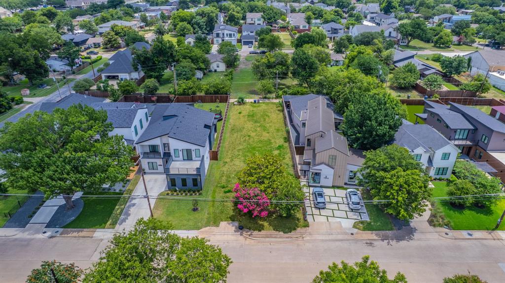 Rare infill opportunity at 7610 Roper St — a cleared, build-ready .211-acre lot (53' x 173.5') that's one of the deepest in the immediate area. Utilities are at the street, so you can move from closing to construction without the typical teardown headaches. Surrounded by recently completed modern new construction, the comps and buyer demand are already established. Minutes from the Dallas North Tollway, Love Field, and the shops and restaurants of Inwood Village, this is a location that sells itself. Bring your plans and capitalize on one of the last sizable lots in a proven rebuild corridor.