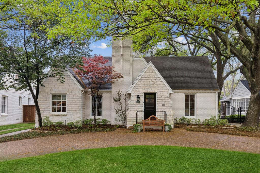 Showings start Monday, April 7th at noon.  Effortless Style Meets Classic Tudor Charm in University Park.  4225 Stanford Avenue is a beautifully updated single-story Tudor designed for modern living with timeless appeal. Inside, two living areas offer plenty of room to relax or entertain, centered around a cozy fireplace that brings warmth and style.  The updated kitchen is sleek and functional, perfect for hosting or daily living.  With high-end finishes throughout, double-paned windows, and great natural light, every space feels elevated and inviting. Three well-proportioned bedrooms, including a primary suite with a spacious spa-like bathroom with dual sinks and a separate tub and shower. A landscaped patio creates the ideal outdoor escape, and the garage and circle drive add rare convenience. Located in the heart of University Park, just blocks from Miracle Mile shopping and dining, and zoned to sought-after Hyer Elementary — this home delivers luxury, location, and livability in one.