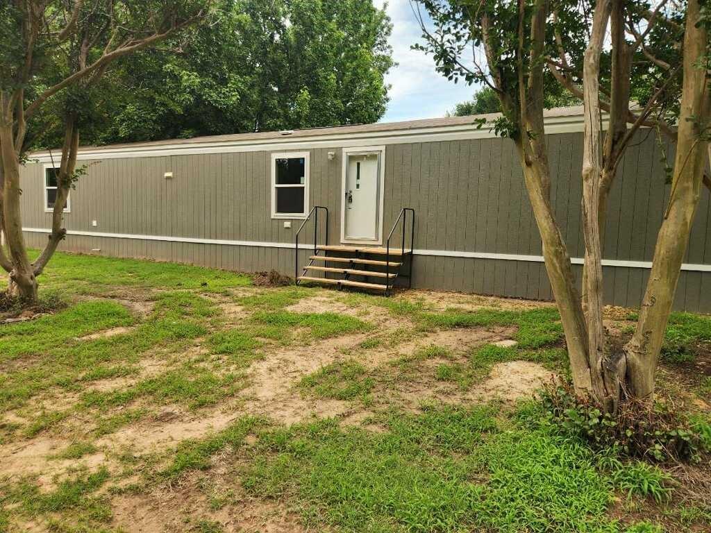 Move-In Ready 2025 Home Minutes from Cedar Bayou
Brand-new 3-bed, 2-bath manufactured home on three lots near Lake Texoma — ideal for weekend living, full-time use, or Airbnb.
Brand-new 2025 manufactured home in Wright Acres Estates near Cedar Bayou on Lake Texoma. This 14 x 76,  1064 sq. ft. 3-bedroom, 2-bath home sits on three lots (275, 276 & 277) totaling approximately 0.41 acres, offering plenty of outdoor space and flexibility. The home features modern finishes, a bright and comfortable layout, and two outbuildings perfect for lake gear, tools, or storage. This location is ideal for a weekend lake retreat, full-time residence, or Airbnb investment. Cedar Bayou is known for its relaxed lake-community atmosphere, wooded surroundings, and quick access to boating, fishing, and Cedar Bayou Marina. Move-in ready and perfectly positioned for anyone wanting to enjoy the Texoma lifestyle.
