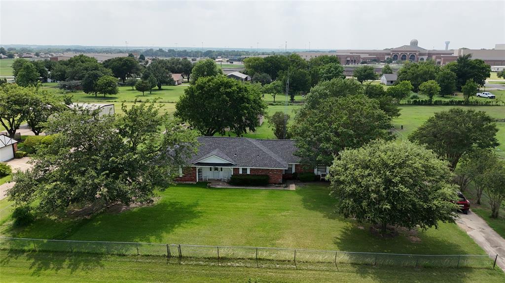 Investor special — fixer-upper on a 1-acre lot. Converted garage now used as a room + restroom. Outside city limits, only 6 minutes to Hwy 35.  Ideal for rehab, flip, or rental. Roof is recent, with plenty of parking space. Sold as is, no repairs will be made.