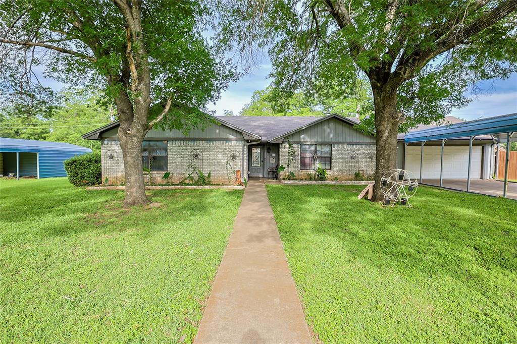 Welcome to the tranquil Rio Brazos waterfront community. This Beautiful home sits on three well-manicured lots. Enjoy the peace and quiet just 20 minutes away from I20. The spacious 3 bedroom 2 bath home features an open eat in kitchen perfect for the chef in the family. The huge living space is great for family gatherings. Step through the sunroom to an amazing backyard with a covered patio. The community has it all with a pool, playground and boat ramp. Life on the river is second to none. Come see this hidden gem before it's too late.