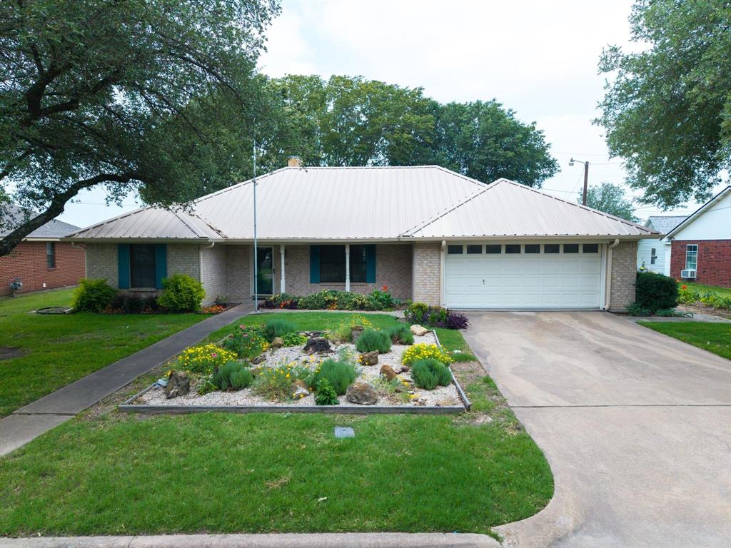 Welcome to this charming 3 bedroom, 2 bathroom home offering a bright, open floorplan and peaceful country surroundings. The spacious living area flows seamlessly into a well-appointed kitchen featuring abundant cabinetry, granite countertops, and plenty of workspace for cooking and entertaining.
The dining room is wrapped in windows, filling the space with natural light and providing stunning views of the beautiful backyard and the open neighboring pasture. It’s the perfect spot to enjoy morning coffee or evening meals with a view.
The spacious primary suite offers a comfortable retreat with room for a king-size bed and additional furniture. The layout offers privacy from the secondary bedrooms, and the large windows bring in soft natural light throughout the day, creating a peaceful atmosphere perfect for winding down at the end of the day.  The attached bathroom provides convenience and a sense of separation from the main living areas.
A roomy 2-car garage offers convenience and storage, while the durable metal roof adds long-lasting value and peace of mind.
Come take a look at this beautiful home today!!