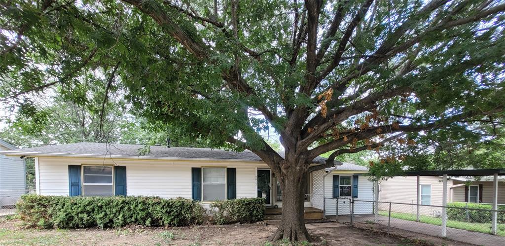 3 bedroom 2 bath home in lovely Lake Worth! Easy access to the freeway, and just minutes to downtown Fort Worth. Covered front porch. Living room with ceiling fan and recessed lighting. Open breakfast area and kitchen with wood look flooring. Built in dishwasher, microwave, and gas range. Split bedroom arrangement. Nice size master suite with walk in closet and attached bath. Bath includes corner walk in shower and built in medicine cabinet. Original hardwood floors in back bedroom. Hall bath includes a tub and shower combination. Large covered wood deck in fenced backyard. Great space for entertaining. Barbecue, set up an outdoor living space, or just relax on this big wood deck. Storage building, gazebo, and garden area in backyard too. Covered front porch has room for a couple of rocking chairs. 1 car carport. Fenced front yard too. Texas shaped paving stones lead you to the front door. Huge shade tree compliments the front yard.