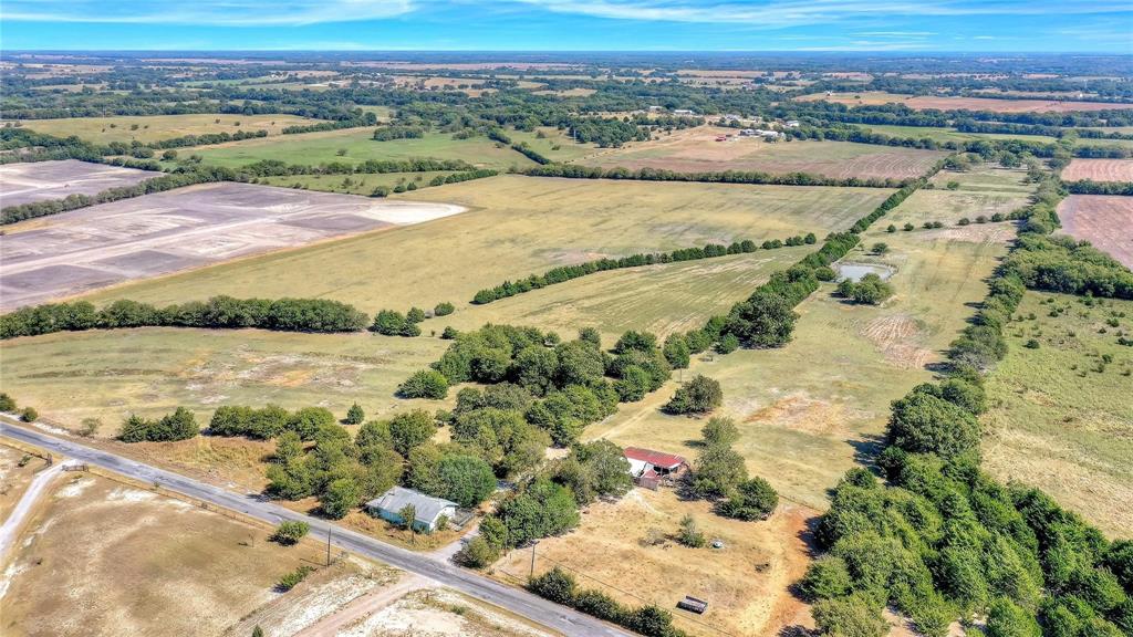 PHASE 1 of the master-planned development for 1-acre lots has received FULL APPROVAL from the City of Van Alstyne and is ready for immediate construction. All necessary entitlements are in place, allowing developers to move forward without delays and start building right away. 68.3-acre property with quick access to Van Alstyne and US Hwy 75, located in the highly sought-after VAISD. This beautiful tract features rolling terrain, mature trees, a scenic pond, native grasses, and a fully fenced perimeter. Adjacent acreage to the north is currently under development, adding to the area’s growth and future value. Ideally situated just 20 minutes from McKinney and 45 minutes from the intersection of US-75 and I-635. The property is located outside city limits. Water is provided by South Grayson Water Co-op, and electricity is available through Grayson-Collin Electric Co-op. An AG exemption is currently in place. DO NOT TRESPASS. Contact the listing agent for access.